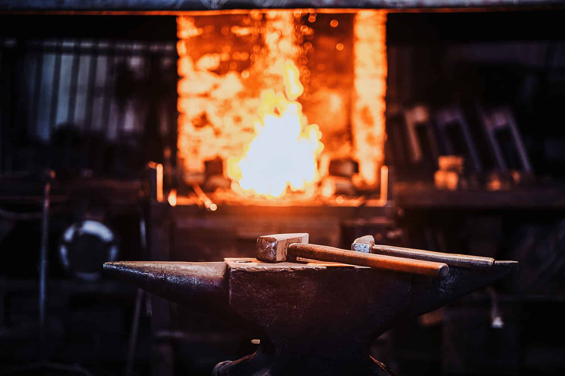 dark stithy workshop with hammer anvil firs plan fire stove background 1